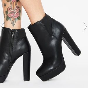 Black platform Dolls Kill boots